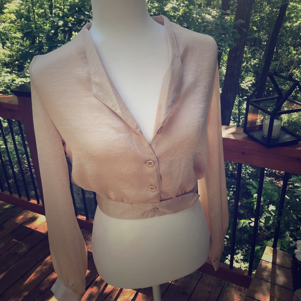 Blush colored top.
